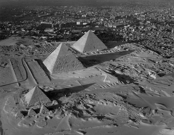 Three Pyramids of Giza with Cairo, 1993. copyright photographer Marilyn Bridges
