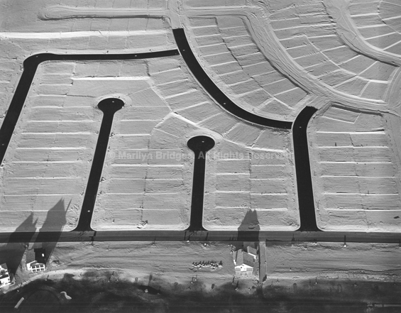 Housing Development Developing, Arizona, 1991. USA West. copyright photographer Marilyn Bridges.