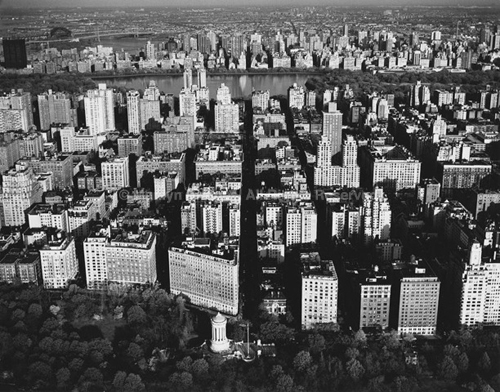Manhattan and Central Park Reservoir, New York City, 1985. USA New York City. copyright photographer Marilyn Bridges.