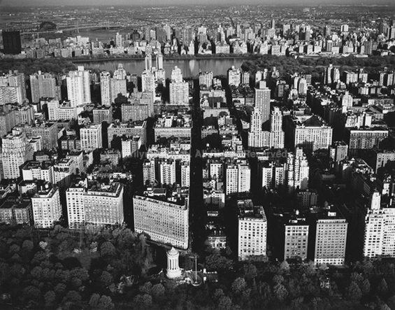 Manhattan and Central Park Reservoir, New York City, 1985. USA New York City. copyright photographer Marilyn Bridges.