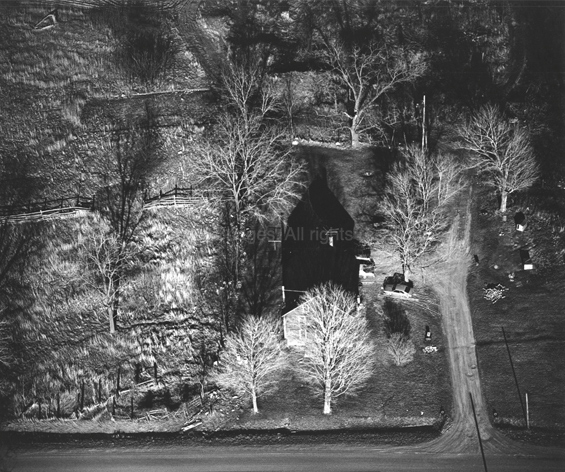 Farm House, Le Roy, New York, 1981. USA Northeast. copyright photographer Marilyn Bridges.