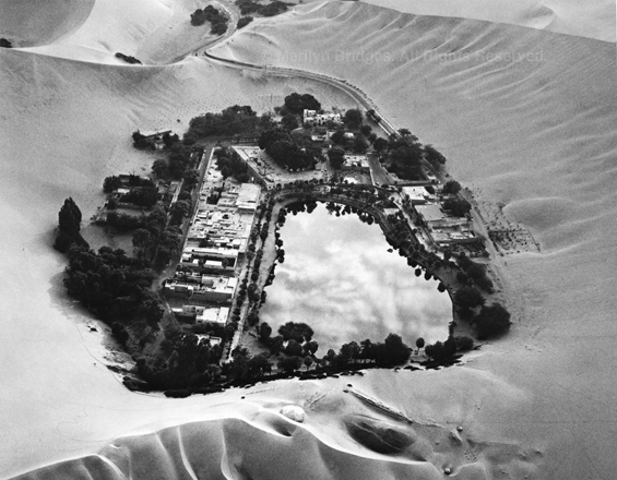 Huacachina Oasis near Ica, Peru, 1989. Latin America. copyright photographer Marilyn Bridges