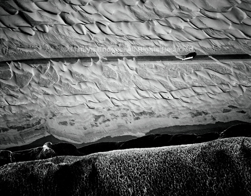 Dunes and Truck, Pan American Highway, Chala, Peru, 1989. Latin America. copyright photographer Marilyn Bridges